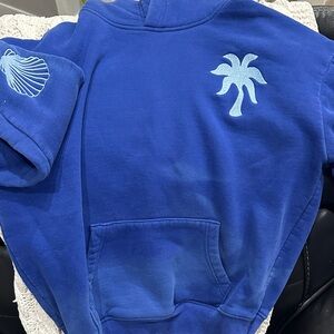 Kids Blue Hoodie with Palm Tree and Shell Design-note some fading.